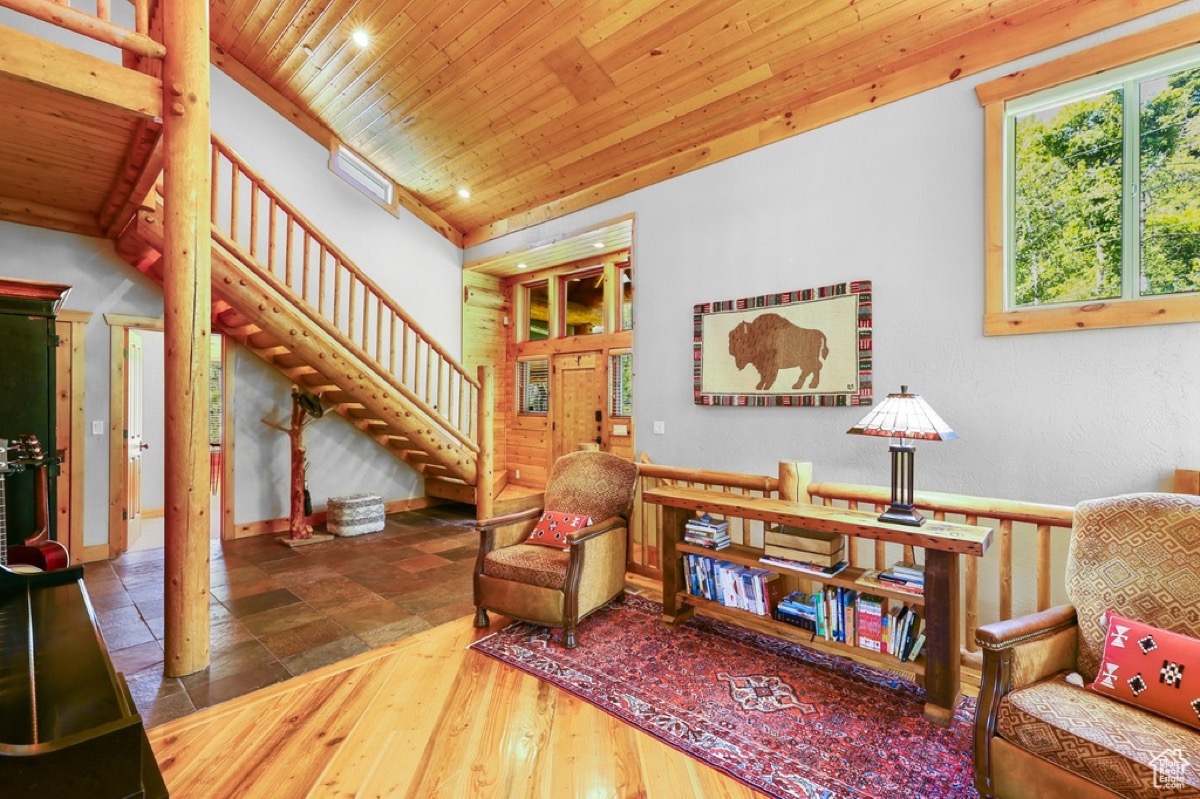 Entry and staircase interior of Timp Haus group cabin with bison art