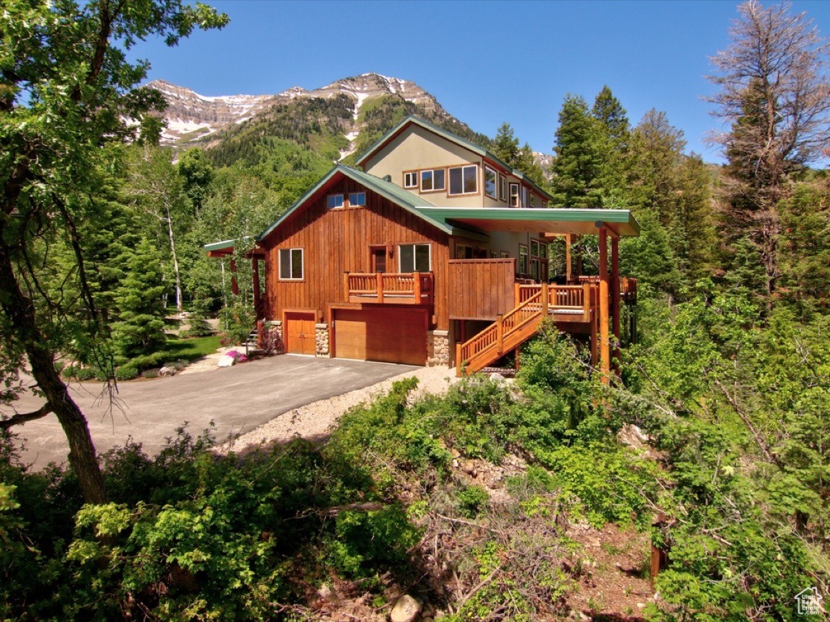 Timp Haus exterior in winter with snow-capped Mount Timpanogos behind