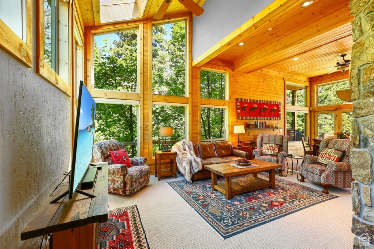 Great room with wall of windows at Timp Haus — the main common gathering space
